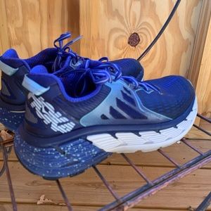 Hoka One, blue athletic shoes.  Size 9, very light wear.  Great condition.